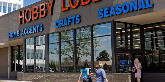 FILE: May 22, 2013: Customers are seen at a Hobby Lobby store in Denver.