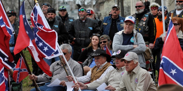 FILE: Confederate flag supporters attend a rally held by Sons of Confederate Veterans in Shawnee, Oklahoma