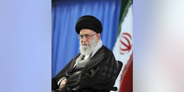 FILE - In this file picture released by the official website of the office of the Iranian supreme leader on Saturday, July 11, 2015, Supreme Leader Ayatollah Ali Khamenei attends a meeting with university students in Tehran, Iran. Khamenei is opposed to a landmark nuclear deal reached with world powers, prominent hard-liner Hossein Shariatmadari, editor of the daily newspaper Kayhan and a representative of Khamenei, claimed in an editorial Saturday, Aug. 15, 2015. (Office of the Iranian Supreme Leader via AP, File)