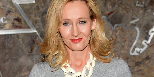 FILE - In this April 9, 2015 file photo, "Harry Potter" author J.K. Rowling lights the Empire State Building to mark the launch of her non-profit children's organization Lumos, in New York. Rowling received a PEN award for her writing and for her humanitarian work. Speaking Monday night, May 16, 2016, before hundreds gathered for PEN America’s annual gala at the American Museum of Natural History, the “Harry Potter” author noted that she opposed a recent petition calling for banning the presumptive Republican presidential nominee, Donald Trump, from entering the United Kingdom, saying such actions endangered everyone’s rights. (Photo by Evan Agostini/Invision/AP, File)