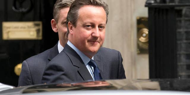 British Prime Minister David Cameron leaves from 10 Downing Street in London, to attend Prime Minister's Questions at the Houses of Parliament, Wednesday, June 8, 2016. (AP Photo/Matt Dunham)