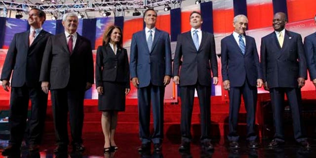 FILE - In this Sept. 7, 2011, file photo Republican presidential candidates stand together before a Republican presidential candidate debate at the Reagan Library in Simi Valley, Calif. They will debate again on Sept. 22, 2011, in Orlando. (AP Photo/Chris Carlson, File)