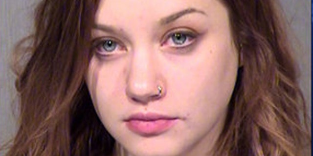 Lauren Tamburrelli was booked on suspicion of drunken driving and murder in the deaths of two during an auto crash.