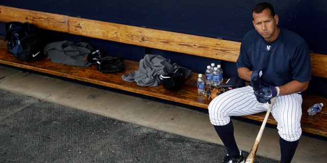 FILE - In this Feb. 25, 2012, file photo, New York Yankees' Alex Rodriguez sits in the dugout during practice at baseball spring training in Tampa, Fla.  Baseball is threatening to kick Rodriguez out of the game for life unless the Yankees star agrees not to fight a lengthy suspension for his role in the sport's latest drug scandal, according to a person familiar with the discussions. The person spoke to The Associated Press on Wednesday, July 31, 2013, on condition of anonymity because no statements were authorized. (AP Photo/Matt Slocum, File)