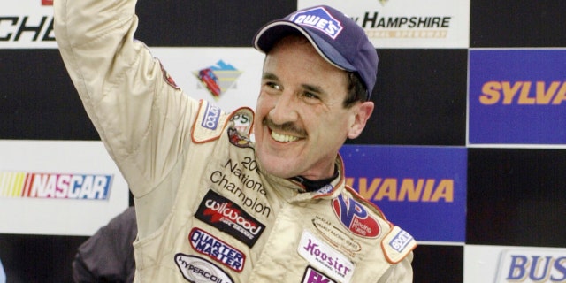 In this Sept. 16, 2005 file photo, Ted Christopher celebrates his victory in the Busch North Series Sylvania 125 at the New Hampshire International Speedway in Loudon, N.H.