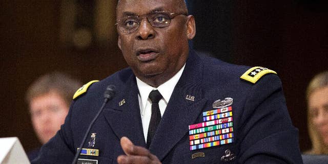 In this Sept. 16, 2015, photo, U.S. Central Command Commander Gen. Lloyd Austin III, testifies on Capitol Hill in Washington. The Obama administration is preparing a major overhaul of its failed effort to train thousands of moderate Syrian rebels to fight the Islamic State group, shifting from preparing rebels for frontline combat to a plan to embed them with established Kurdish and Arab forces in northeastern Syria, U.S. officials said. The discussion of a new approach comes a day after Austin, told Congress that the $500 million effort to train 5,000 moderate Syrian rebels in a year had yielded "four or five" new fighters after another 50 or so were captured, wounded or fled in their first encounter with extremist militants. (AP Photo/Pablo Martinez Monsivais)