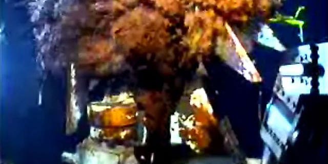 June 23, 2010: This image from video provided by BP shows oil gushing from the broken wellhead at the site of the Deepwater Horizon oil well in the Gulf of Mexico.
