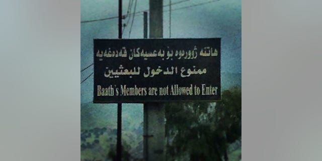 Outside a memorial for chemical weapons attack victims in the Kurdish town of Halabja