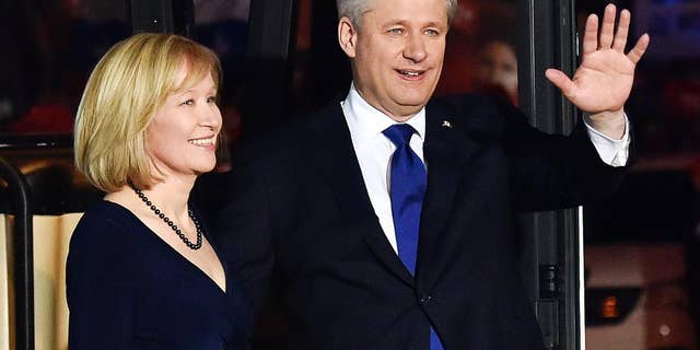 Conservative leader Stephen Harper, right, and his wife Laureen Harper arrive for the final leaders debate in Montreal on Friday, Oct. 2, 2015. (Nathan Denette/The Canadian Press via AP) MANDATORY CREDIT