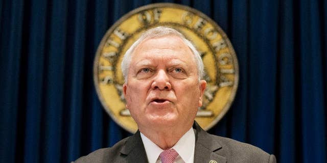 Georgia Gov. Nathan Deal speaks during a press conference to announce he has vetoed legislation allowing clergy to refuse performing gay marriage and protecting people who refuse to attend the ceremonies Monday, March 28, 2016, in Atlanta. The Republican rejected the bill on Monday, saying, "I do not think that we have to discriminate against anyone to protect the faith-based community in Georgia." (AP Photo/David Goldman)