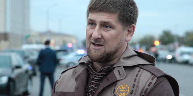 FILE - In this Oct. 5, 2014 file photo Chechen regional leader Ramzan Kadyrov talks with the press in the Chechen regional capital, Grozny, Russia. Ramzan Kadyrov’s comments on Wednesday, April 22, 2015 send a worrying sign about a potential rift between him and the Kremlin. The head of Chechnya has allowed local security forces to open fire on federal troops if they operate in the region without his approval. (AP Photo/Musa Sadulayev, File)