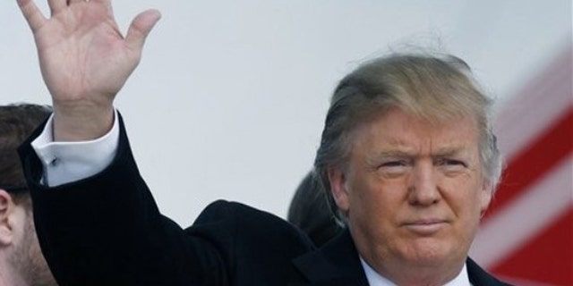 US billionaire Donald Trump arrives at Aberdeen Airport, Scotland, Wednesday May 26, 2010, to give a press conference about his plans for the "world's greatest" luxury golf and housing project on the Menie Estate in Aberdeenshire. Protesters opposed to Donald Trump's planned $1.5 billion Scottish golf resort say they've pulled a trick shot out of their bag, a legal move which will force the U.S. tycoon to confront more than 60 landowners rather than just a lone holdout. At the center of the plan is local fisherman Michael Forbes, who has long been an irritant to Trump. Forbes refuses Trump's offer of nearly $700,000 (488,000 pounds) to buy his family's run-down farm, which sits at the center of the planned resort. (AP Photo/Danny Lawson/PA Wire) ** UNITED KINGDOM OUT NO SALES NO ARCHIVE **