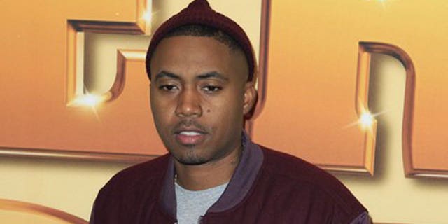 October 24, 2011: Rapper Nas arrives for the premiere of the film "Tower Heist" in New York.