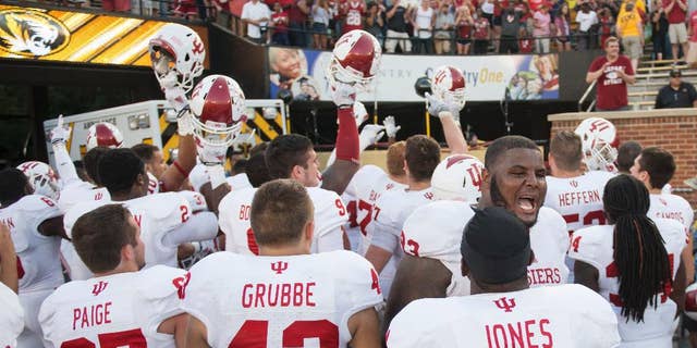 The Indiana football team celebrates in front of fans after Indiana upset Missouri, 31-27, in an NCAA college football game Saturday, Sept. 20, 2014, in Columbia, Mo. (AP Photo/L.G. Patterson)