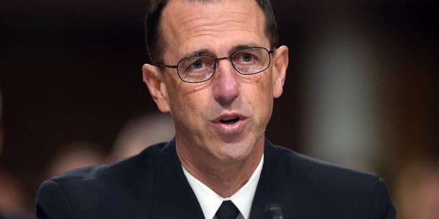 FILE - In this Sept. 15, 2016, file photo, U.S. Chief of Naval Operations Adm. John Richardson testifies on Capitol Hill in Washington. The U.S. Navy is scrapping its decision to eliminate dozens of enlisted sailors’ job titles, including many that end in “man,” after hitting an onslaught of opposition from the force. The decision to drop long-held traditional titles and instead refer to sailors by their rank was announced in September and signaled a sharp cultural shift for the Navy. Richardson, the chief of naval operations, said in a memo that modernizing the job ratings or titles was designed to give sailors more flexibility in training and assignments. (AP Photo/Susan Walsh, File)