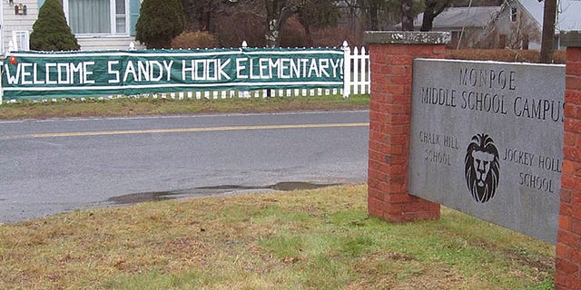 This December 2012 photo provided by The Newtown Bee shows a sign welcoming Sandy Hook Elementary School students, of Newtown, Conn., to the Chalk Hill School campus in neighboring Monroe, Conn.  An open house was planned for the Sandy Hook students Wednesday, Jan. 2, 2013 at the former Chalk Hill School, overhauled specially for them. Classes for the Sandy Hook students start there on Thursday.  (AP Photo/The Newtown Bee, Andy Hutchison)