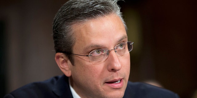 Puerto Rico Gov, Alejandro Javier Garcia Padilla testifies on Capitol Hill in Washington, Tuesday, Dec. 1, 2015, before the Senate Judiciary Committee hearing on Puerto Rico's fiscal problems. Puerto Rico and its debt crisis takes center stage in Congress as its governor testifies before a Senate panel about the U.S. commonwealth's financial woes and the demands of creditors.(AP Photo/Pablo Martinez Monsivais)