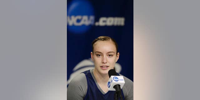 BYU's Lexi Eaton speaks at a news conference ahead of team practice in Lincoln, Neb., Friday, March 28, 2014. BYU will play Connecticut in an NCAA Lincoln Regional women's semifinal basketball game on Saturday. (AP Photo/Nati Harnik)