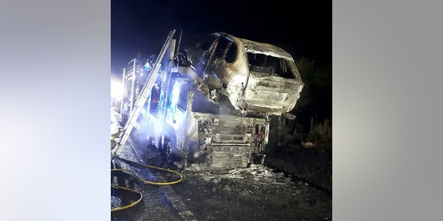 A transporter carrying a dozen novelty cars including a BATMOBILE caught fire - burning a number of vintage vehicle to bits. See SWNS story SWFIRE; The lorry was travelling westbound on the M4 near Bath on Wednesday night when it went up in flames. Highways England was forced to shut two lanes of the motorway as firefighters battled the blaze into the early hours of Thursday. It is not know the extent of damage the cars suffered, but Highways England said a number of the specialists cars along with the transporter cab had been destroyed. The truck had been transporting a number of classic cars including a âDukes of Hazzardâ General Lee, Batmobile, âTransformersâ Ford Mustang and âStarsky and Hutchâ Ford Torino.