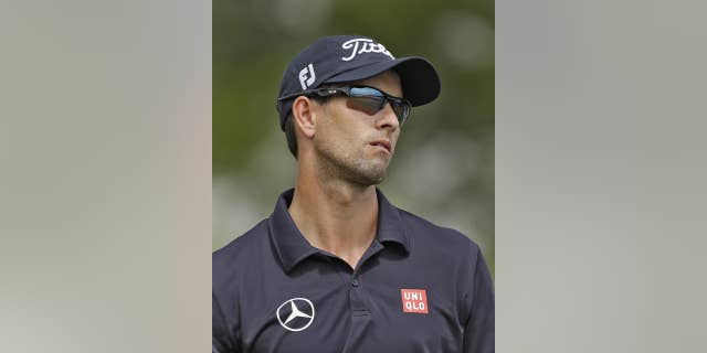 Adam Scott, of Australia, reacts to a missed birdie putt on the fifth hole during the final round of the Arnold Palmer Invitational golf tournament at Bay Hill, Sunday, March 23, 2014, in Orlando, Fla. (AP Photo/Chris O'Meara)