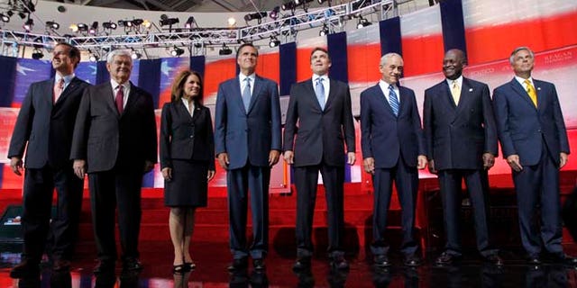 Republican presidential candidates, from left to right: former Pennsylvania Sen. Rick Santorum, former House Speaker Newt Gingrich, Rep. Michele Bachmann, R-Minn., former Massachusetts Gov. Mitt Romney, Texas Gov. Rick Perry, Rep. Ron Paul, R-Texas, Businessman Herman Cain and former Utah Gov. Jon Huntsman.