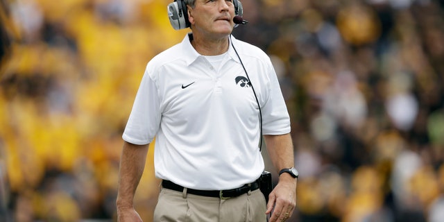 Iowa head coach Kirk Ferentz looks on from the sideline during the first half of an NCAA college football game against Michigan State, Saturday, Oct. 5, 2013, in Iowa City, Iowa. Michigan State won 26-14. (AP Photo/Charlie Neibergall)