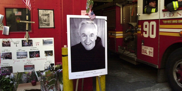 FILE: Memorial for Mychal Judge, New York Fire Department chaplain, and other firefighters lost in World Trade Center attack.