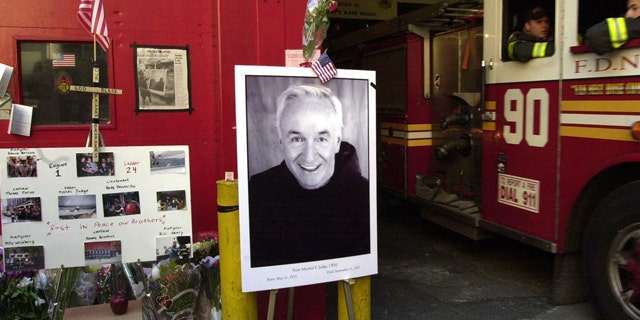 FILE: Memorial for Mychal Judge, New York Fire Department chaplain, and other firefighters lost in World Trade Center attack.