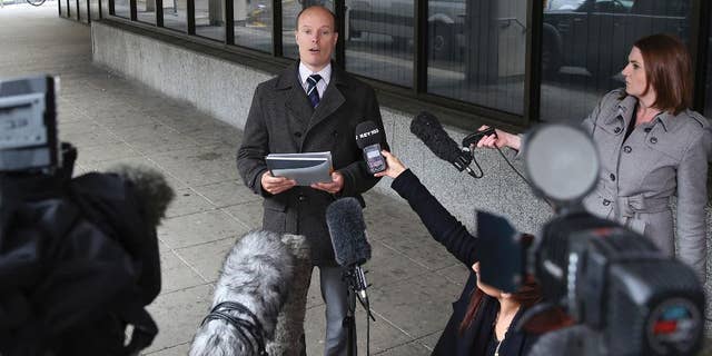 Ben Southam, Senior Crown Prosecutor from the CPS North West Complex Casework Unit, talks to the media outside Manchester Crown Court, Manchester England, Monday, May 18, 2015, after nurse Victorino Chua was found guilty by a jury of murdering and poisoning hospital patients at Stepping Hill Hospital. A medical mystery that began four years ago with unexplained deaths in a British hospital ended Monday when a “frustrated” nurse was convicted of using insulin to murder two patients. The 49-year-old nurse, a father of two daughters, was also convicted of trying to poison 20 other patients during what police called a reign of terror at Stepping Hill Hospital in Stockport, 200 miles (320 kilometers) northwest of London. (Peter Byrne/PA via AP) UNITED KINGDOM OUT