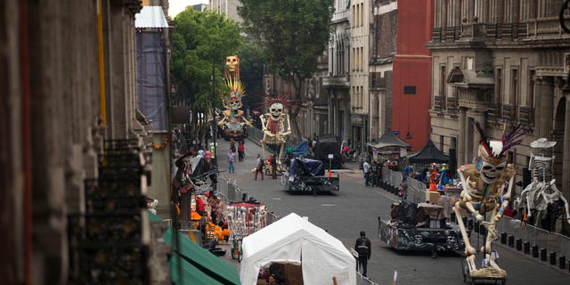 Crew members work on the James Bond film "Spectre" in the historic center of Mexico City, Thursday, March 19, 2015.