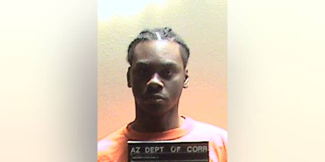 FILE - This file photo provided by Arizona Department of Corrections shows Fernandes Masters. An indictment obtained by The Associated Press is revealing new details about Masters assault on a female corrections officer in Yuma, but state correction officials still refuse to release their investigation report. The indictment against Masters alleges he fondled and kissed her and tried to have intercourse with her. Prison officials have said the officer was rescued by co-workers after calling for help during the April 13, 2015 attack. (Arizona Department of Corrections via AP, File)
