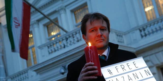 FILE -- In this Jan. 16, 2017 file photo, Richard Ratcliffe, husband of imprisoned charity worker Nazanin Zaghari-Ratcliffe, poses for the media during an Amnesty International led vigil outside the Iranian Embassy in London. The family of Zaghari-Ratcliffe who was detained in Iran while on a trip with her toddler daughter says all efforts to appeal her five-year prison sentence in court have failed. Ratcliffe, who works for the Thomson Reuters Foundation, the charitable arm of the news agency, found out this weekend that her appeal to Iran's supreme court failed. (AP Photo/Alastair Grant, File)