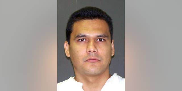 This undated handout photo provided by the Texas Department of Criminal Justice shows Manuel Garza Jr. Garza is scheduled to be executed for the 2001 shooting death of San Antonio, Texas, SWAT officer John “Rocky” Riojas. (Texas Department of Criminal Justice via AP)
