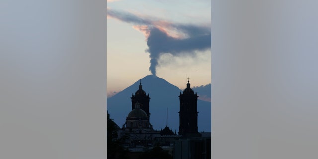 April 14, 2012: A plume of steam rises from the Popocatepetl volcano seen from the city of Puebla, Mexico.