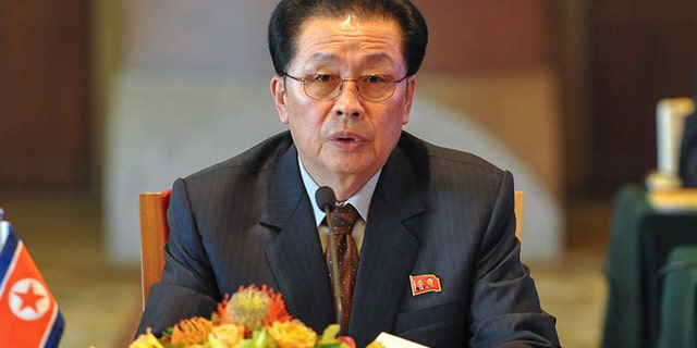 Aug. 14, 2012: In this file photo provided by China's Xinhua News Agency, Jang Song Thaek, North Korea's vice chairman of the powerful National Defense Commission, attends the third meeting on developing the economic zones in North Korea, in Beijing.