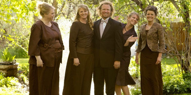 In this publicity image released by TLC, the Browns, from left, Janelle, Christine, Kody, Meri, and Robyn from the TLC series, "Sister Wives," are shown.