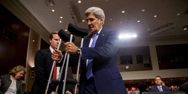 Secretary of State John Kerry arrives on Capitol Hill in Washington, Wednesday, July 29, 2015, to testify before a Senate Armed Services Committee hearing on the impacts of the Joint Comprehensive Plan of Action (JCPOA) on U.S. Interests and the Military Balance in the Middle East. (AP Photo/Andrew Harnik)