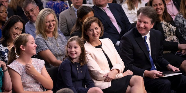 Kavanaugh, shown here with his wife, Ashley Estes Kavanaugh, and their two young daughters, Margaret and Liza.