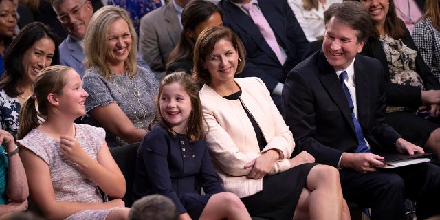 Kavanaugh, shown here with his wife, Ashley Estes Kavanaugh, and their two young daughters, Margaret and Liza.
