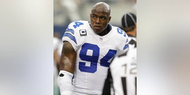 File - In this Sept. 22, 2013, file photo, Dallas Cowboys defensive end DeMarcus Ware walks the field during the second quarter of an NFL football game in Arlington, Texas. The Dallas Cowboys are releasing franchise sacks leader Ware to save salary cap room after the worst season of his career. (AP Photo/LM Otero, File)
