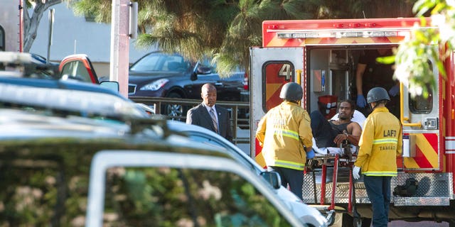 Gene Evin Atkins, 28, is being held on suspicion of murder following the deadly standoff at a California Trader Joe's.
