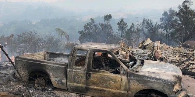 This early Saturday, July 7, 2018, photo shows the damage to vehicles and buildings off Fairview Ave., in Goleta, Calif.