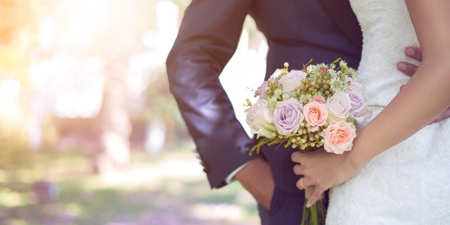 A bride and groom agreed to have a kid-free wedding and let their family and friends know in advance, according to one inquisitive Reddit post. (iStock)