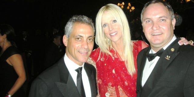 The Salahis photographed with White House chief of staff Rahm Emanuel at last week's state dinner.