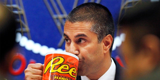 FCC Chairman Ajit Pai has been trolled for his oversized Reese's mug.