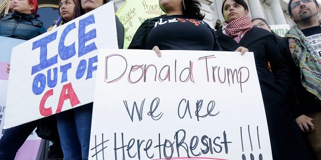 California's sanctuary state legislation, which takes effect Jan. 1, would ban police from asking people about their immigration status or participating in federal immigration enforcement activities.