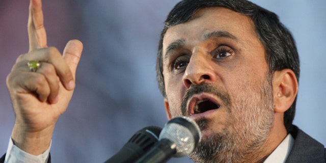 June 3: Iranian President Mahmoud Ahmadinejad gestures as he addresses the crowd at a ceremony honoring late revolutionary founder Ayatollah Khomeini, on the eve of his 22nd death anniversary at his mausoleum, just outside Tehran, Iran.