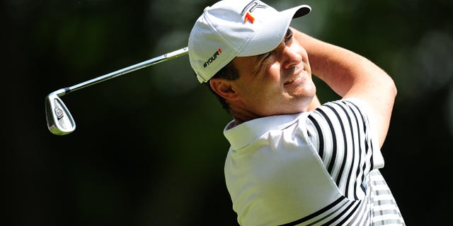England's Simon Khan in action during round four on day four of the PGA Championship at the Wentworth Club, in Virginia Water, England, Sunday May 26, 2013. (AP Photo/Adam Davy, PA) UNITED KINGDOM OUT - NO SALES - NO ARCHIVES
