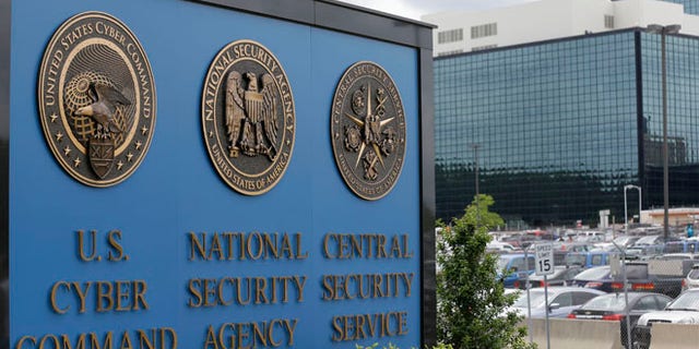 FILE - This June 6, 2013, file photo shows the sign outside the National Security Agency campus in Fort Meade, Md. A presidential advisory panel has recommended dozens of changes to the government's surveillance programs, including stripping the NSA of its ability to store Americans' telephone records and requiring a court to sign off on the individual searches of phone and Internet data. (AP Photo/Patrick Semansky, File)