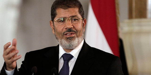 Critics fear Egyptian President Mohamed Morsi's regime is taking the nation further toward Islamic extremism. (AP)